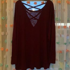 Plus size, long sleeve top with criss cross back